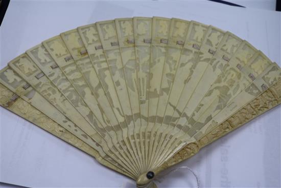 A Chinese ivory brise fan carved with figures